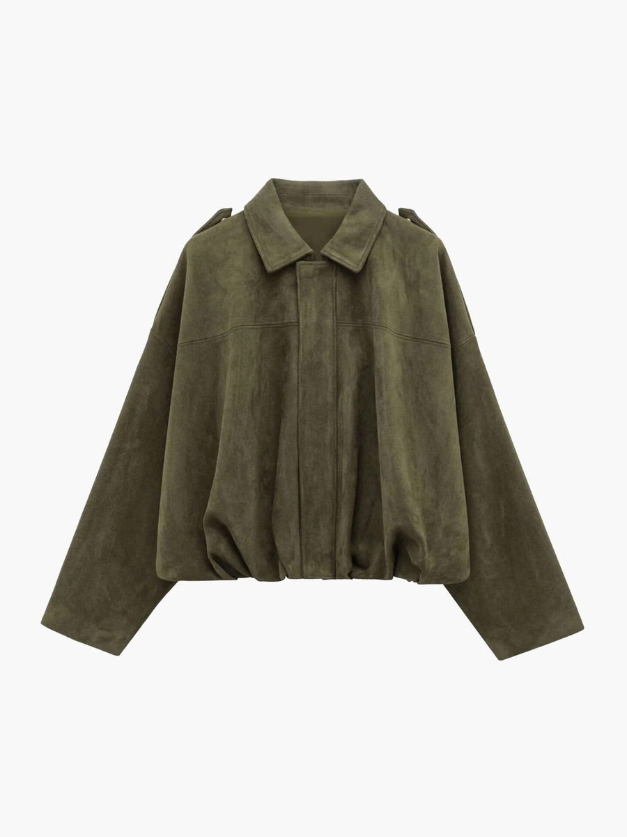 Woman wearing a faux suede collared bomber jacket, front view
