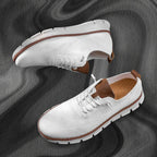 Men's arch-support walking sneakers on foot lifestyle view