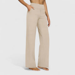Women's wide-leg pull-on trousers with a wide waistband, worn by a model, front view