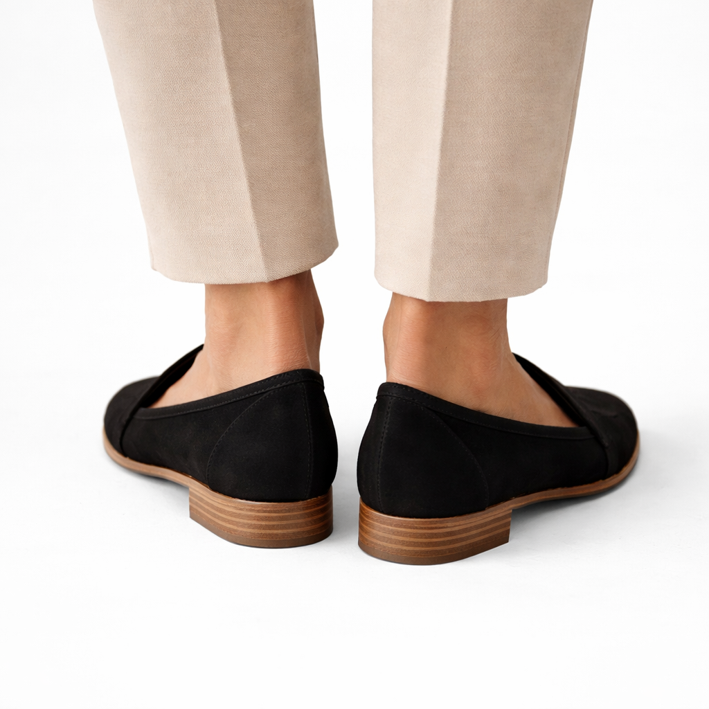 Women's comfort suede loafers in black, styled view